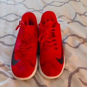 Red Nike running shoes
